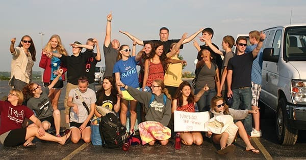 Students and leaders of Calvary Christian Church, Bellevue, NE, prepare to depart on