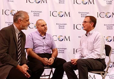 John Samples (left) and Saleem Hanna (center) speak with Mark A. Taylor.