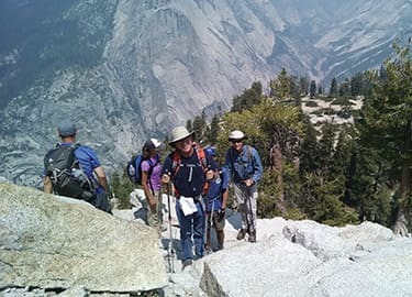 Stephen Bond and elders from Summit Christian Church, Sparks, Nevada, march on to the summit of Half Dome in August 2015.